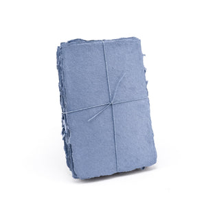 Pack of blue shimmering handmade paper made with 100% cotton recycled from the apparel industry.