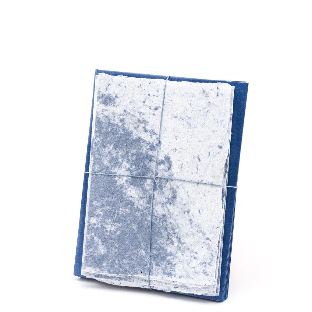 Speckled cotton handmade paper stationery set in swirled blue and white with matching envelopes.